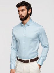 Klasyczna męska koszula SLIM FIT z satynowej tkaniny – niebieska V2 - Rozmiar: XXL. Niebieskie koszule Ombre Clothing, m, bez wzorów, z bawełny, bez kołnierzyka, bez ramiączek. W wyprzedaży za 202.99 zł.