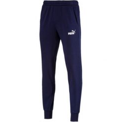 Puma Ess Logo Pants Tr Cl Peacoat L. Spodnie materiałowe marki Puma. W wyprzedaży za 135.00 zł.