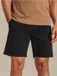 Szorty - czarny. Czarne krótkie spodenki sportowe Sinsay, l, bez wzorów, z bawełny. Za 29.99 zł.