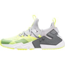 Nike Sportswear AIR HUARACHE DRIFT Sneakersy niskie wolf grey/volt/dark grey/white. Buty sportowe casual marki Nike Sportswear. W wyprzedaży za 369.85 zł.