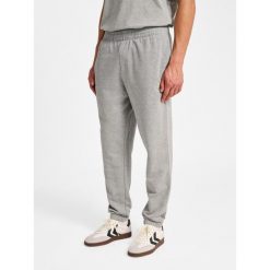 Spodnie do biegania Hummel Pulse. Szare buty do biegania Hummel, bez wzorów, z dresówki, bez zapięcia, do biegania. Za 170.00 zł.