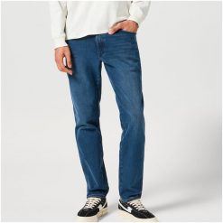 WRANGREL MĘSKIE SPODNIE RIVER MISTY BLUE 112356840 W17T008814. Niebieskie jeansy Wrangler, l. Za 189.99 zł.