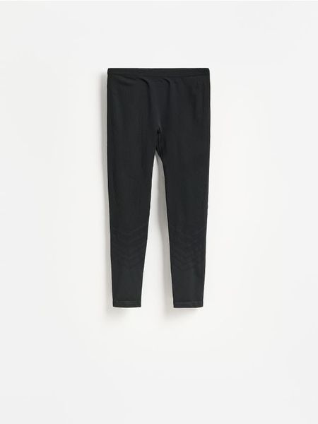 Sportowe legginsy - czarny. Czarne legginsy długie sportowe Reserved, l, bez wzorów, z dzianiny. Za 99.99 zł.