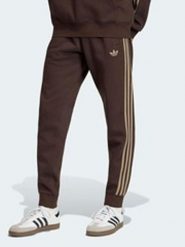 Adidas Spodnie dresowe w kolorze brązowym rozmiar: L. Brązowe spodnie treningowe długie Adidas, l, bez wzorów, z dresówki. Za 164.95 zł.