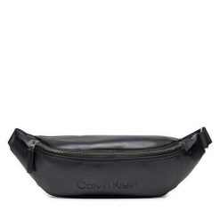 Saszetka nerka Calvin Klein. Czarne saszetki i nerki CALVIN KLEIN, bez wzorów. Za 259.99 zł.