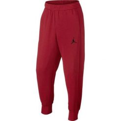 Jordan Spodnie męskie Flight Pant czerwone r. XL (823071-687). Spodnie treningowe długie marki Jordan. Za 453.94 zł.
