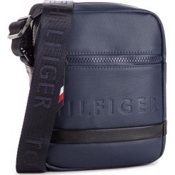 Saszetka TOMMY HILFIGER - Offshore Mini Reporter AM0AM04233 902. Saszetki i nerki Tommy Hilfiger. W wyprzedaży za 189.00 zł.