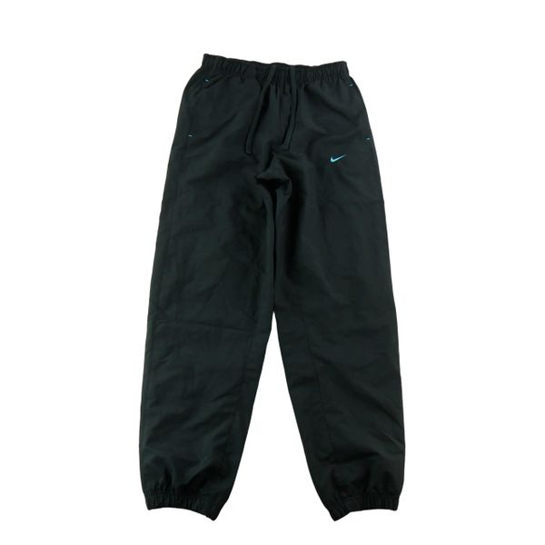 Second life - Nike spodnie dresowe męskie Dri-FIT jogger - Jak nowy. Czarne joggery i bojówki Nike, m, bez wzorów, z dresówki, eleganckie. Za 106.46 zł.