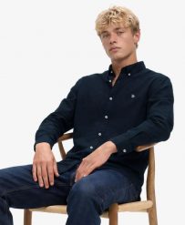 Superdry Klasyczna koszula Oxford z długim rękawem – 100% bawełna organiczna,. Niebieskie koszule Superdry, s, bez wzorów, z bawełny, bez kołnierzyka, bez ramiączek. Za 323.85 zł.