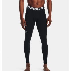 Legginsy termoaktywne męskie UNDER ARMOUR szybkoschnące termiczne. Czarne bielizna termoaktywna Under Armour, m, bez wzorów, do piłki nożnej. Za 159.99 zł.