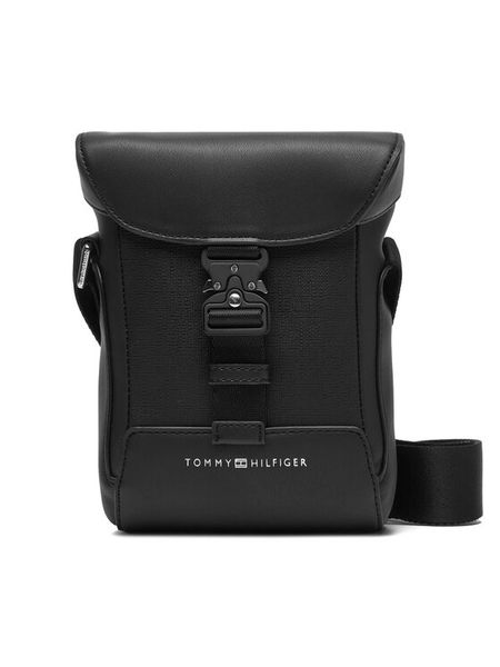 Tommy Hilfiger Saszetka Th Modern Flap Mini Reporter AM0AM13940 Czarny. Czarne saszetki i nerki Tommy Hilfiger, bez wzorów, ze skóry. Za 239.99 zł.