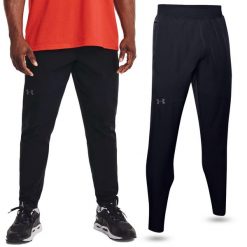 Spodnie fitness męskie Under Armour Unstoppable Tapered. Czarne buty treningowe Under Armour, bez wzorów, na fitness i siłownię. Za 407.00 zł.