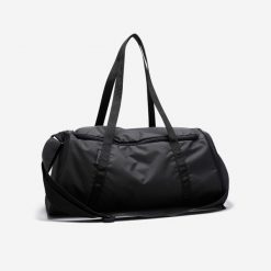 Torba fitness Domyos 20 l. Czarne torby na ramię DOMYOS, bez wzorów, z materiału, na ramię, bez dodatków. W wyprzedaży za 39.99 zł.