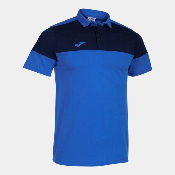 Polo Joma Crew V. Niebieskie koszulki polo Joma, bez wzorów, z bawełny, bez kołnierzyka, bez ramiączek, do piłki nożnej. W wyprzedaży za 137.90 zł.