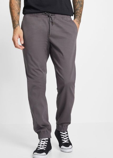 Spodnie chinosy z gumką, relaxed fit, z prostą nogawką. Szare eleganckie spodnie bonprix, na co dzień, m. Za 127.99 zł.