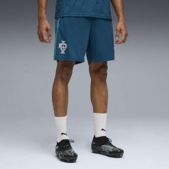 Męskie dopasowane szorty treningowe Portugalia PUMA. Niebieskie krótkie spodenki sportowe Puma, m, bez wzorów. Za 199.00 zł.
