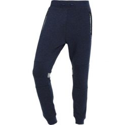 Superdry GYM TECH STRIPE JOGGER Spodnie treningowe midnight navy marl/grey grit. Joggery i bojówki marki Superdry. Za 339.00 zł.