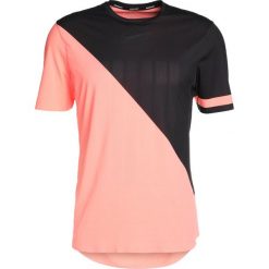 Nike Performance Tshirt z nadrukiem lava glow/black/black. T-shirty marki Nike Performance. W wyprzedaży za 233.10 zł.