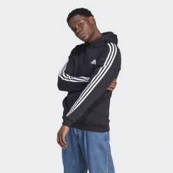 Bluza męska adidas Essentials Fleece 3-Stripes Hoodie. Niebieskie bluzy z kapturem Adidas, m, bez wzorów, z materiału, z kapturem. Za 222.00 zł.