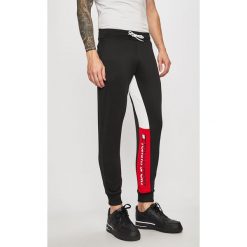 Tommy Sport - Spodnie. Czarne spodnie treningowe długie Tommy Sport, m, bez wzorów, z dzianiny. Za 369.90 zł.