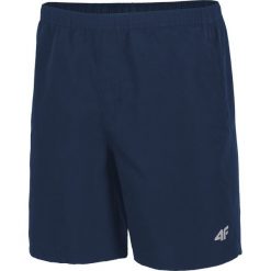 Spodenki treningowe męskie SKMT301 - granatowy ciemny. Krótkie spodenki sportowe marki 4F. W wyprzedaży za 39.99 zł.