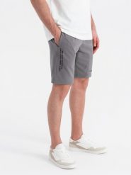 Dopasowane męskie krótkie dresowe spodenki z nadrukami – szare V3 OM-SRSK-0138 - XXL. Szare krótkie spodenki sportowe Ombre Clothing, l, bez wzorów, z bawełny. W wyprzedaży za 79.99 zł.