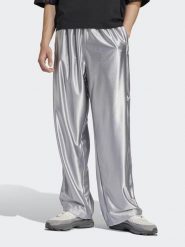 Adidas Spodnie dresowe w kolorze srebrnym rozmiar: XS. Szare spodnie treningowe długie Adidas, xs, bez wzorów, z dresówki. Za 122.67 zł.