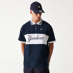 Polo New York Yankees Graphic. Niebieskie koszulki polo New Era, m, bez wzorów, bez kołnierzyka, bez ramiączek. Za 266.50 zł.