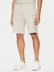 Calvin Klein Szorty sportowe Micro Logo K10K111208 Beżowy Regular Fit. Brązowe krótkie spodenki sportowe CALVIN KLEIN, m, bez wzorów, z bawełny. Za 279.99 zł.