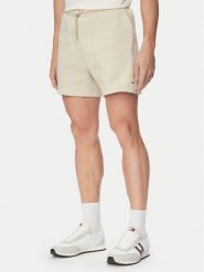 Tommy Jeans Szorty sportowe DM0DM21931 Beżowy jasny Regular Fit. Brązowe krótkie spodenki sportowe Tommy Jeans, m, bez wzorów, z bawełny. Za 189.99 zł.
