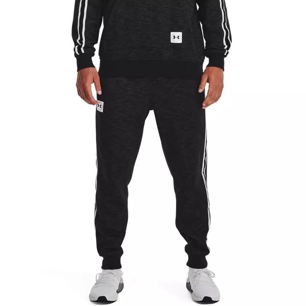 Spodnie dresowe męskie Under Armour Essential Heritage Fleece Jogger. Czarne joggery i bojówki Under Armour, m, bez wzorów, z dresówki. Za 179.99 zł.