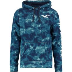 Hollister Co. LOGO Bluza z kapturem türkis. Bluzy z kapturem marki Hollister Co., m, z bawełny, z kapturem. W wyprzedaży za 170.10 zł.
