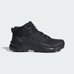 Buty turystyczne Terrex Skychaser AX5 Mid GORE-TEX. Czarne buty turystyczne Adidas, bez wzorów, z gore-texu, bez zapięcia, wspinaczkowe, gore-tex. Za 599.00 zł.