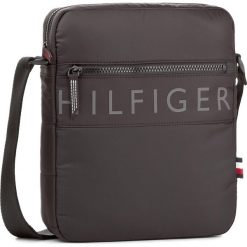 Saszetka TOMMY HILFIGER - Light Nylon Reporter AM0AM02823 002. Saszetki i nerki marki Tommy Hilfiger. W wyprzedaży za 209.00 zł.