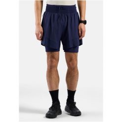 Spodenki męskie Odlo X-ALP TRAIL 6 INCH 2-in-1 short. Niebieskie szorty ODLO, m, bez wzorów, sportowe. W wyprzedaży za 359.99 zł.