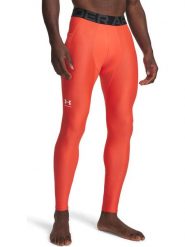 Under Armour Legginsy sportowe "HG Armour" w kolorze pomarańczowym rozmiar: L. Pomarańczowe legginsy długie sportowe Under Armour, l, bez wzorów, z materiału, outdoorowe. Za 158.47 zł.