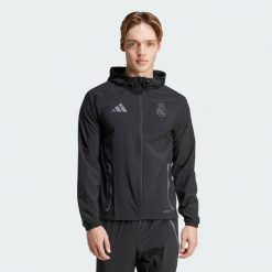 Kurtka z kapturem Real Madrid Tiro 2024/25. Czarne kurtki Adidas, xs, bez wzorów, z kapturem. W wyprzedaży za 335.00 zł.
