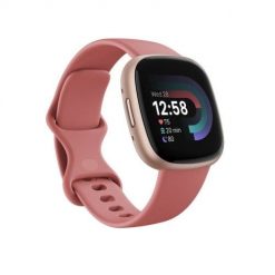 Versa 4 smart watch, pink body with pink silicone strap. Różowe smartbandy FITBIT. Za 771.99 zł.