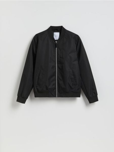 Kurtka bomberka ze stójką - czarny. Czarne kurtki Reserved, l, bez wzorów, bez kaptura. Za 199.99 zł.