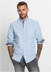 Biznesowa koszula oksfordzka z bawełny o kroju regular fit. Niebieskie koszule bonprix, l, bez wzorów, z bawełny, bez kołnierzyka, bez ramiączek. Za 129.99 zł.