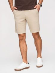 Szorty męskie strukturalne REGULAR FIT - beżowe V1 - Rozmiar: XXL. Brązowe szorty Ombre Clothing, m, bez wzorów, z dzianiny, wakacyjne. W wyprzedaży za 104.99 zł.
