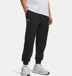 Under Armour UA RIVAL FLEECE JOGGERS Spodnie dresowe męskie. Czarne joggery i bojówki Under Armour, m, bez wzorów, z bawełny, klasyczne. W wyprzedaży za 160.99 zł.