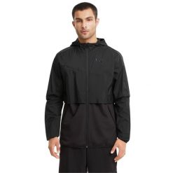 Kurtka sportowa męska Puma Train Woven Ultra. Czarne kurtki do biegania Puma, m, bez wzorów, z nylonu, bez kaptura, do biegania. W wyprzedaży za 320.00 zł.