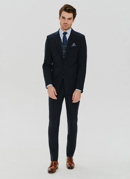 PAKO LORENTE – Gładkie granatowe spodnie garniturowe. Niebieskie eleganckie spodnie Pako Lorente, z elastanu. Za 699.99 zł.