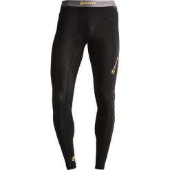 Skins DNAMIC Legginsy black. Spodnie treningowe długie marki Skins, z elastanu. Za 369.00 zł.
