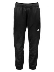 The North Face Spodnie dresowe "Reaxion" w kolorze czarnym rozmiar: XL. Czarne spodnie treningowe długie The North Face, xl, bez wzorów, z dresówki. Za 144.92 zł.