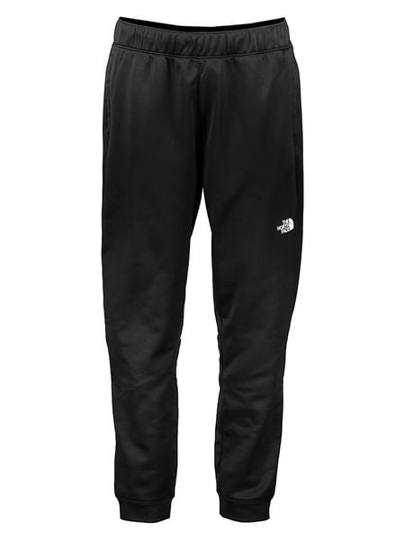 The North Face Spodnie dresowe "Reaxion" w kolorze czarnym rozmiar: S. Czarne spodnie treningowe długie The North Face, s, bez wzorów, z dresówki. Za 139.87 zł.