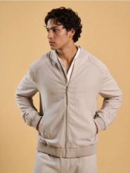 Kurtka bomberka z wiskozy - kremowy. Białe kurtki Sinsay, l, bez wzorów, z wiskozy, bez kaptura. Za 99.99 zł.