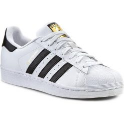 Buty adidas - Superstar C77124 Ftwwht/Cblack/Ftwwht. Buty sportowe casual marki Adidas. W wyprzedaży za 279.00 zł.