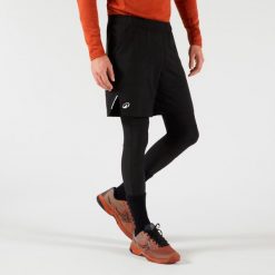 Spodenki - legginsy do tenisa 2w1 męskie Artengo Thermic. Czarne legginsy długie sportowe ARTENGO, m, bez wzorów, tenisowe. Za 149.99 zł.